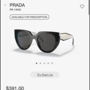 Women’s black and white Prada sunglasses